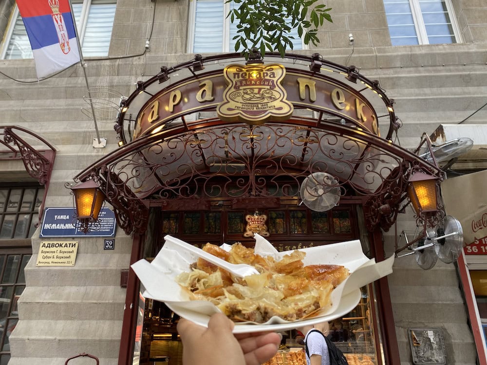 Ashley Holding Burek In Trpkovic Bakery