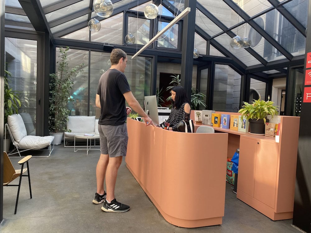 Matthew At Welcome Desk For Virtu Hub Coworking